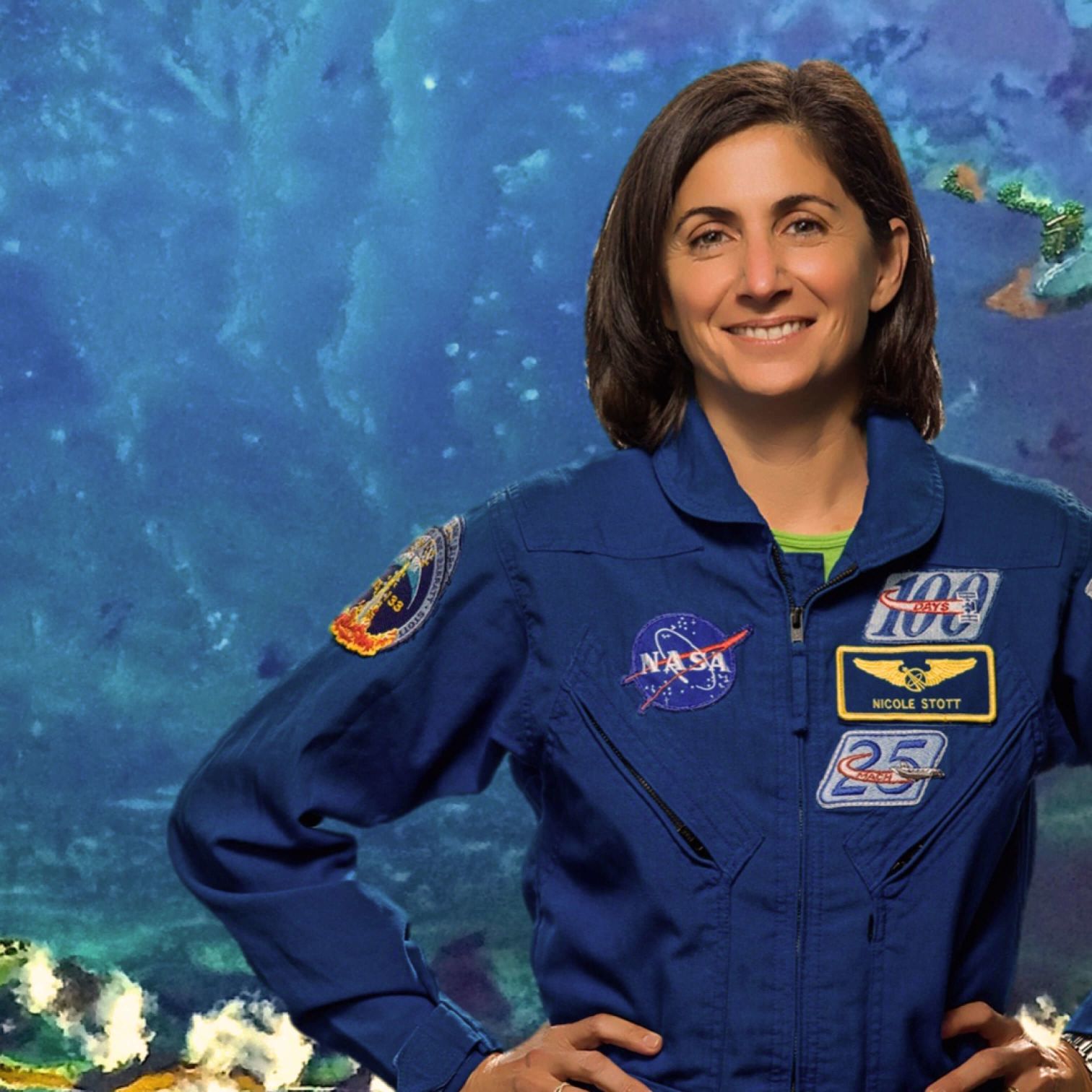 Nicole Stott In A Blue Uniform